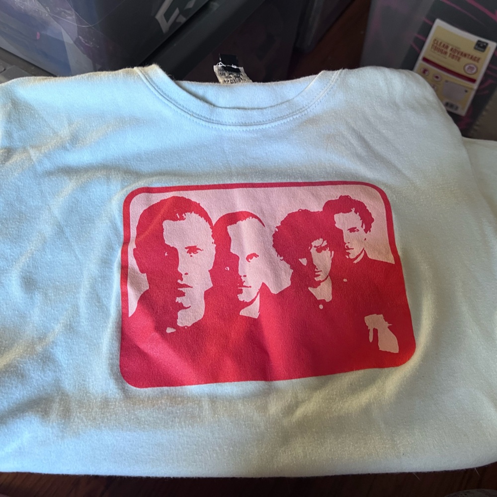 Coldplay tee shirt med but it fits small)